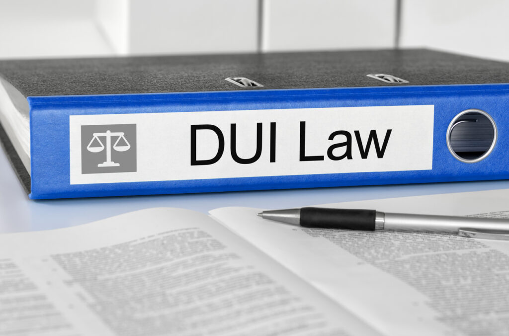 Binder labeled DUI law representing DUI record duration in Washington DC/Maryland