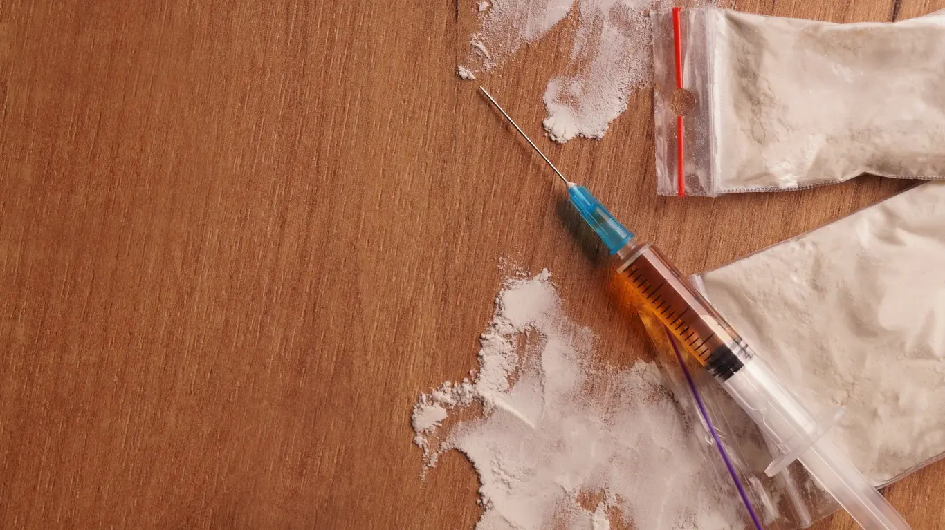 Fentanyl vs. heroin legal charges comparison, highlighting classification differences and their impact on legal outcomes.